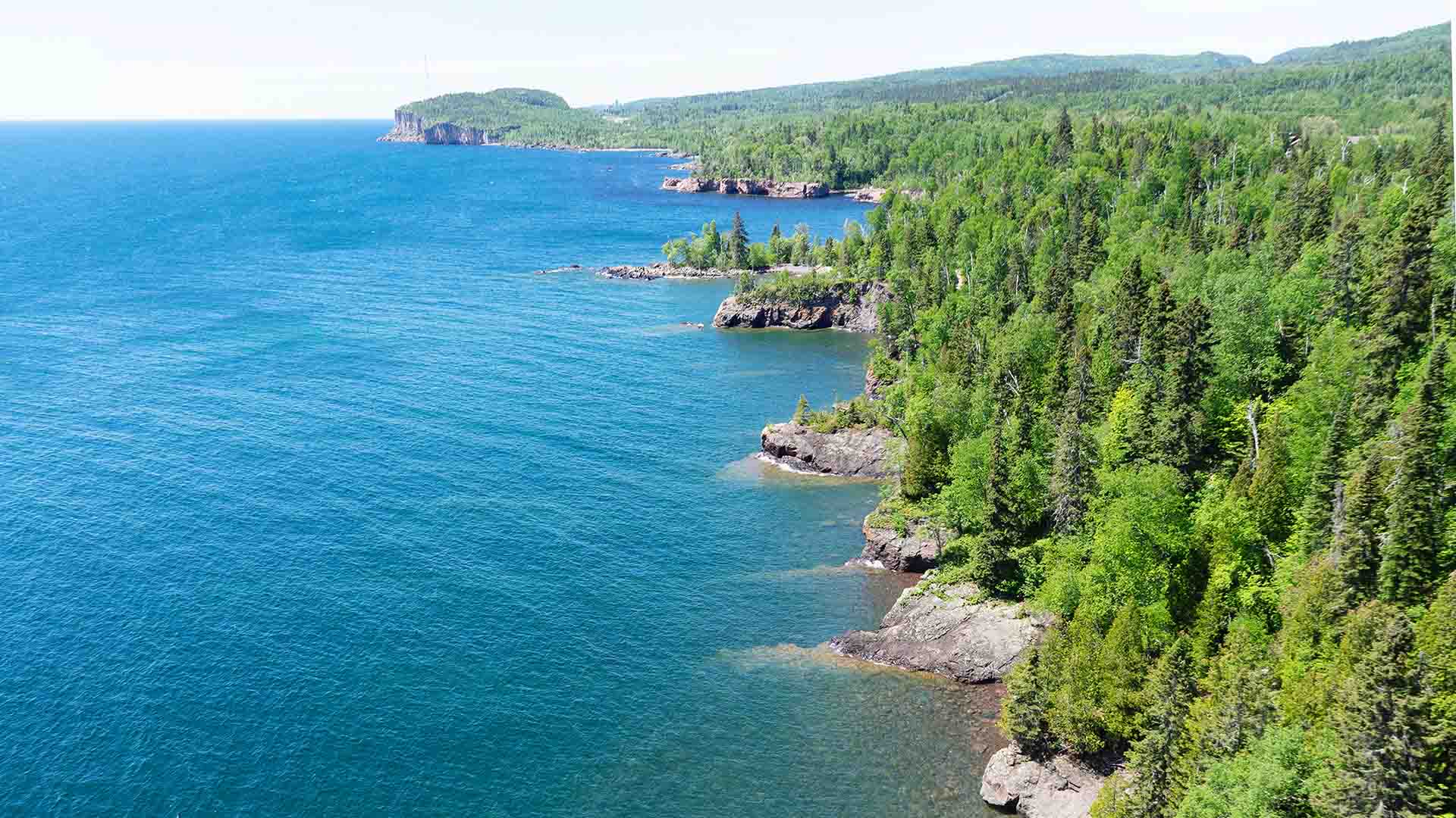 Birdseye view of a shore on the Great Lakes. By Lucas Ludwig on Unsplash