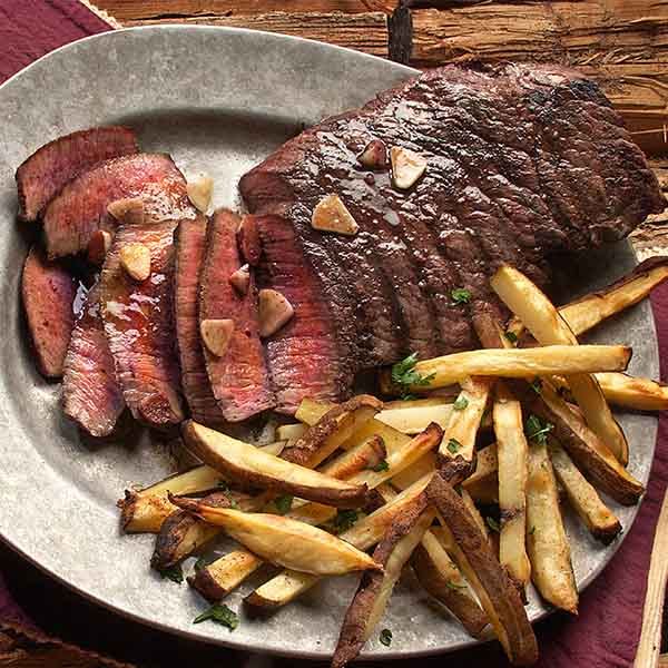 Plate of steak and fries.